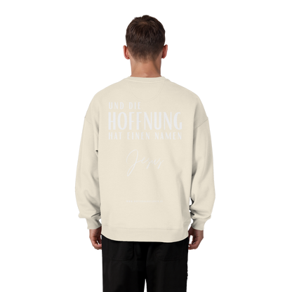 Die Hoffnung hat einen Namen - Jesus - Heavy Oversize Sweatshirt