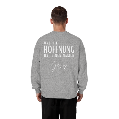 Die Hoffnung hat einen Namen - Jesus - Heavy Oversize Sweatshirt