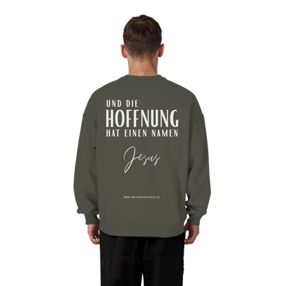 Die Hoffnung hat einen Namen - Jesus - Heavy Oversize Sweatshirt