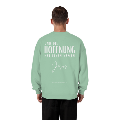 Die Hoffnung hat einen Namen - Jesus - Heavy Oversize Sweatshirt