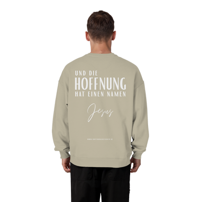 Die Hoffnung hat einen Namen - Jesus - Heavy Oversize Sweatshirt