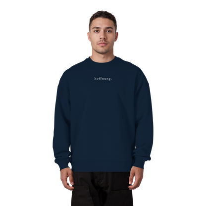 Die Hoffnung hat einen Namen - Jesus - Heavy Oversize Sweatshirt