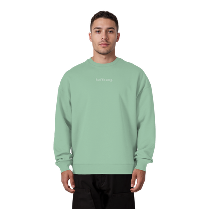 Die Hoffnung hat einen Namen - Jesus - Heavy Oversize Sweatshirt