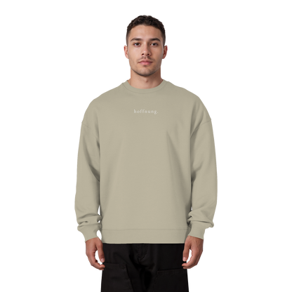Die Hoffnung hat einen Namen - Jesus - Heavy Oversize Sweatshirt